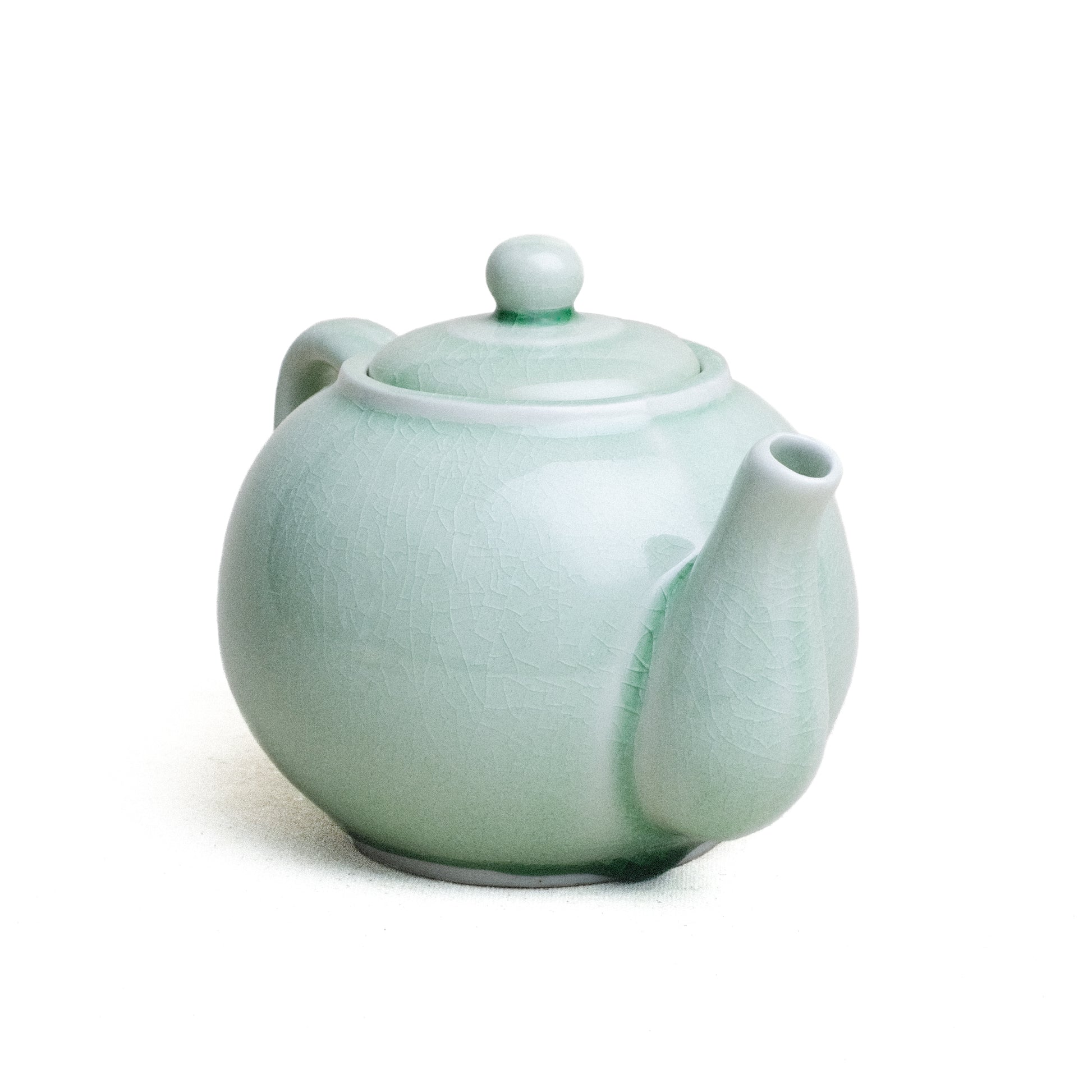 Tea Pot, round, Green Glaze. Frontal view.