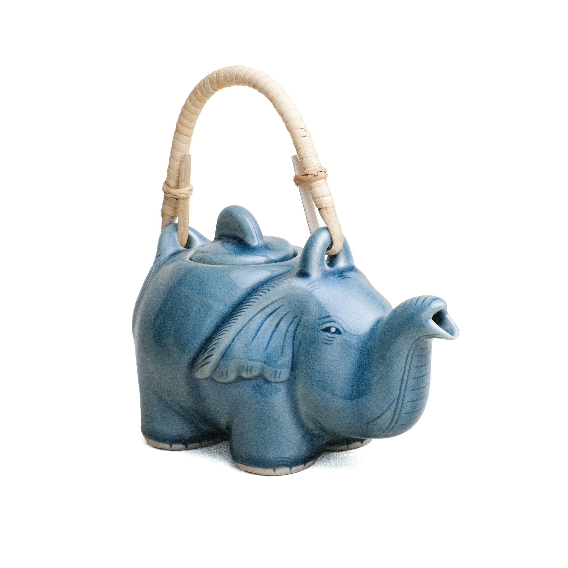 Tea Pot, Standing Elephant with Rattan Handle, Blue Glaze, frontal view.