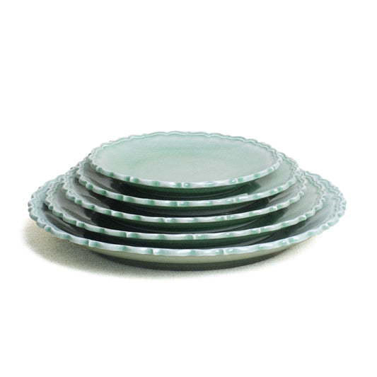 Stack of Plate, Carved Edge, Green Glaze.
