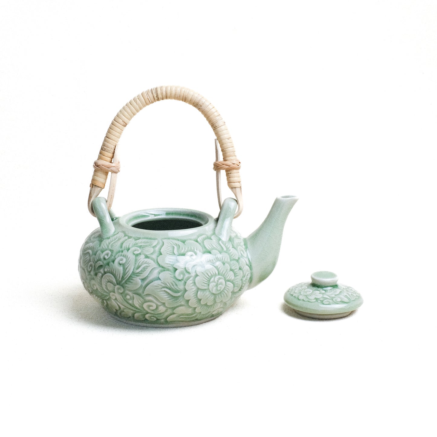 Tea Pot with Rattan Handle and Carved Pudtan Flower